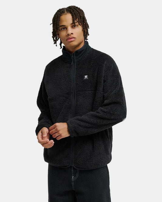 Image of a model wearing Outerwear. Product name - DC Shoes Mens Lynx Fleece Jacket Anthracite in Anthracite colour by brand - DC Shoes