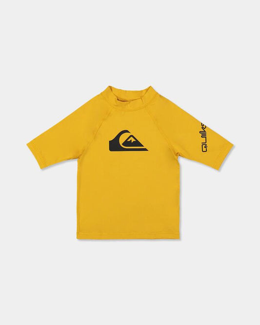 Image of a model wearing Tops. Product name - Quiksilver Boys 2-7 All Time Short Sleeve Rash Vest Mineral Yellow in Mineral Yellow colour by brand - Quiksilver