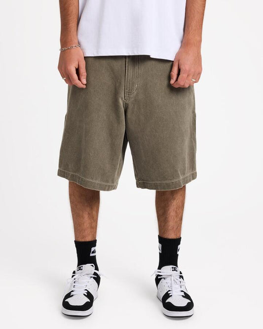 Image of a model wearing Shorts. Product name - Quiksilver Mens Wrench Denim Shorts Canteen in Canteen colour by brand - Quiksilver