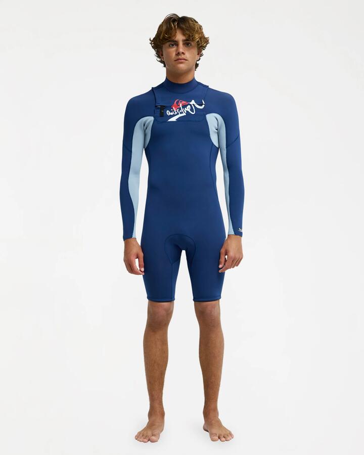 Image of a model wearing Tops. Product name - Quiksilver Mens Young Guns 2/2Mm Full Zip Long Sleeve Springsuit Dark Denim in Dark Denim colour by brand - Quiksilver
