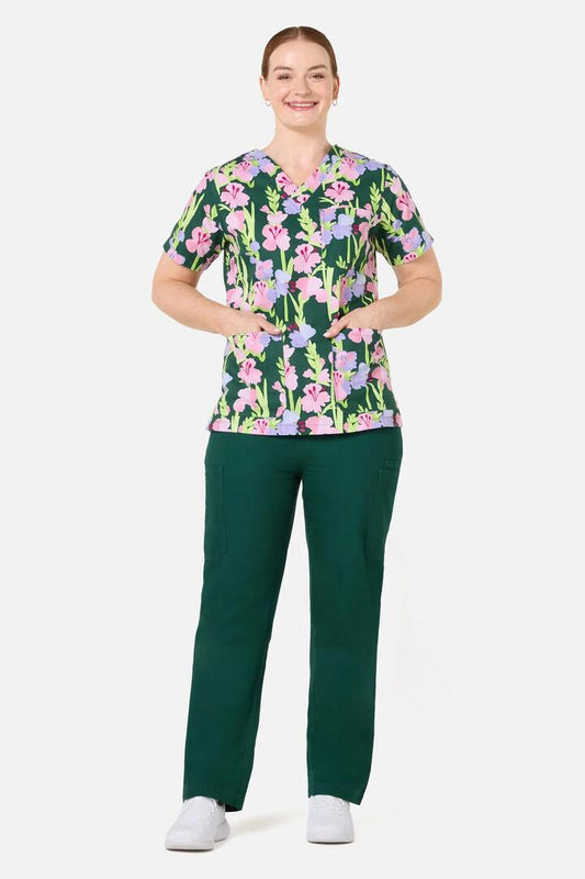 Image of a model wearing Uniforms & Workwear. Product name - Gladioli Top & Pant Scrub Set in Green colour by brand - Gorman
