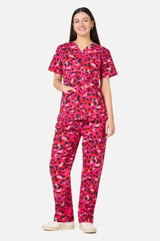 Image of a model wearing Uniforms & Workwear. Product name - Changing Spots Scrub Set in Pink colour by brand - Gorman