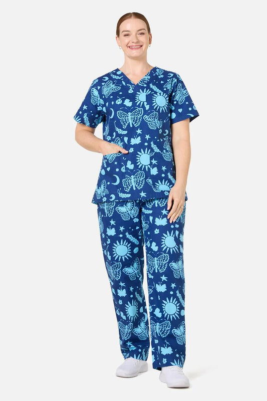 Image of a model wearing Uniforms & Workwear. Product name - Flora Fauna Scrub Set in Blue colour by brand - Gorman