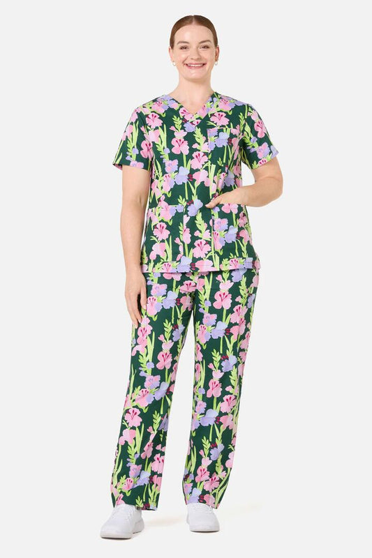 Image of a model wearing Uniforms & Workwear. Product name - Gladioli Scrub Set in Green colour by brand - Gorman