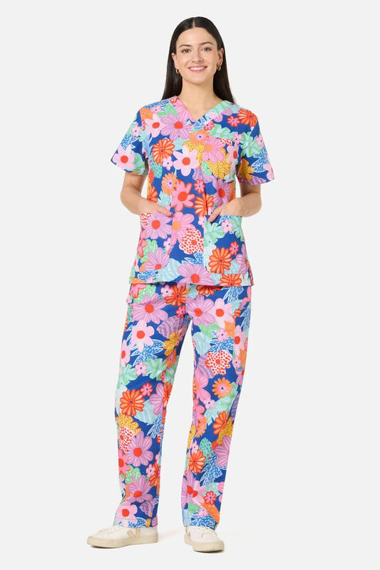 Image of a model wearing Uniforms & Workwear. Product name - Polka Floral Scrub Set in Multi colour by brand - Gorman