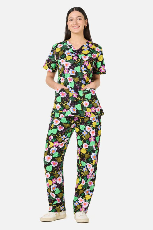 Image of a model wearing Uniforms & Workwear. Product name - Blossom Boulevard Scrub Set in Black colour by brand - Gorman