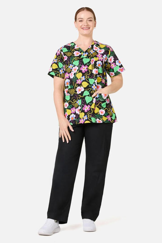Image of a model wearing Uniforms & Workwear. Product name - Blossom Boulevard Mixed Scrubs in Black colour by brand - Gorman