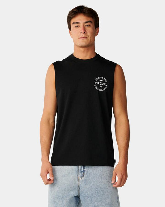 Image of a model wearing Tops. Product name - Rip Curl Mens Staple Muscle Black in Black colour by brand - Rip Curl
