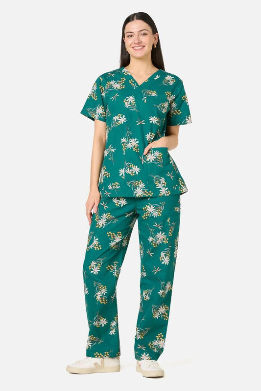 Image of a model wearing Uniforms & Workwear. Product name - Penny Native scrub set in Green colour by brand - Scrubs With Love