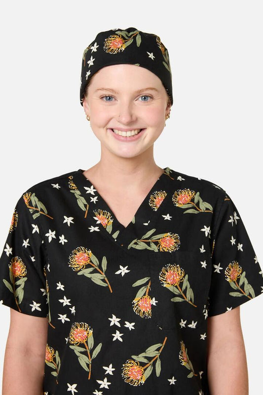 Image of Hats. Product name - Pincushion Protea Scrub Hat in Black colour by brand - Scrubs With Love