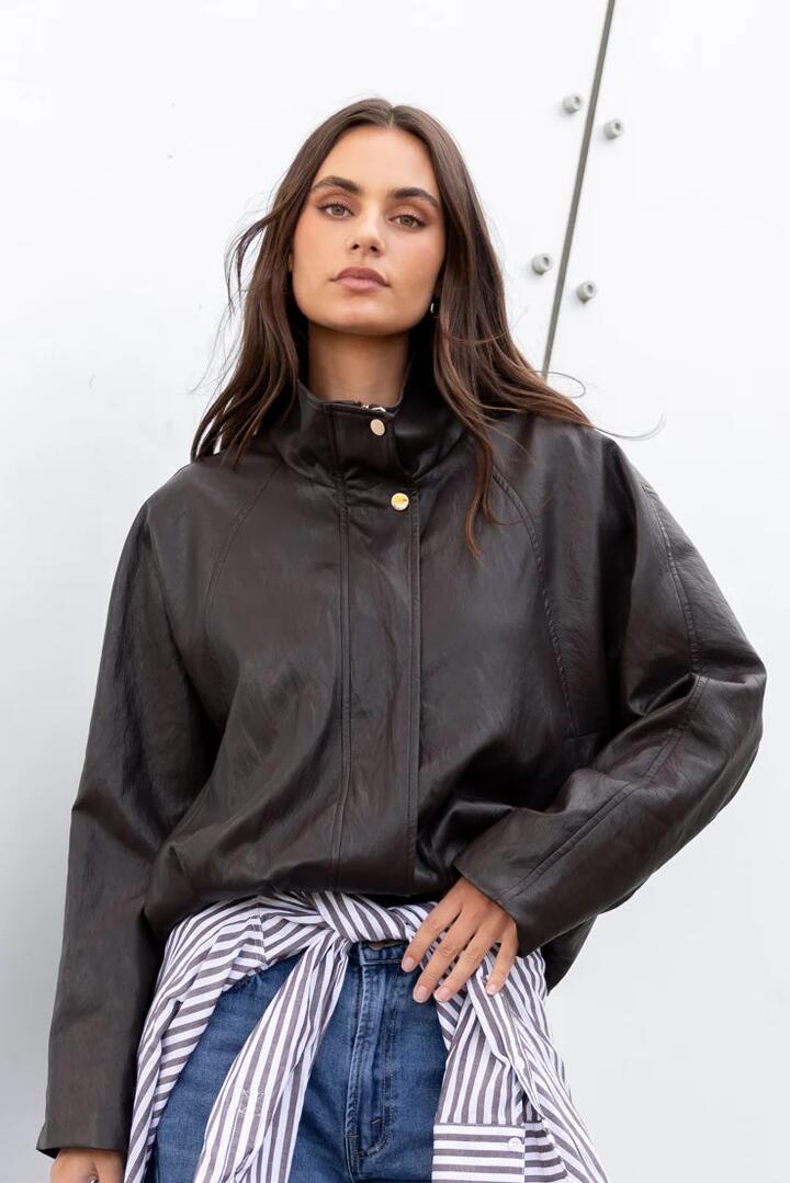 Image of Coats & Jackets. Product name - Ensemble Chocolate Faux Leather Funnel Neck Zip Through Bomber Jacket in Chocolate colour by brand - Stories be Told