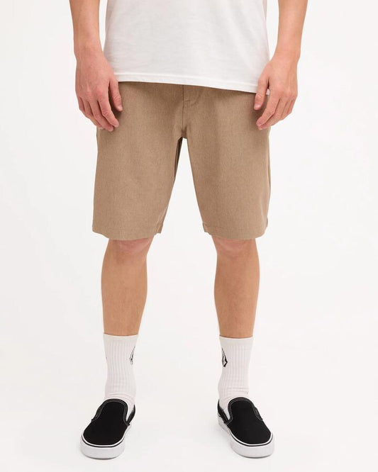 Image of a model wearing Shorts. Product name - Volcom Mens Kerosene Chino Shorts Khaki in Khaki colour by brand - Volcom