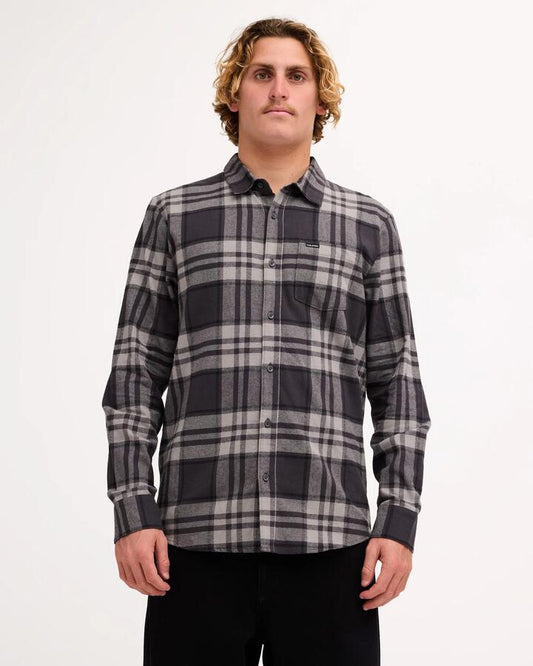 Image of a model wearing Tops. Product name - Volcom Mens Leland Long Sleeve Flannel Asphalt Black in Asphalt Black colour by brand - Volcom