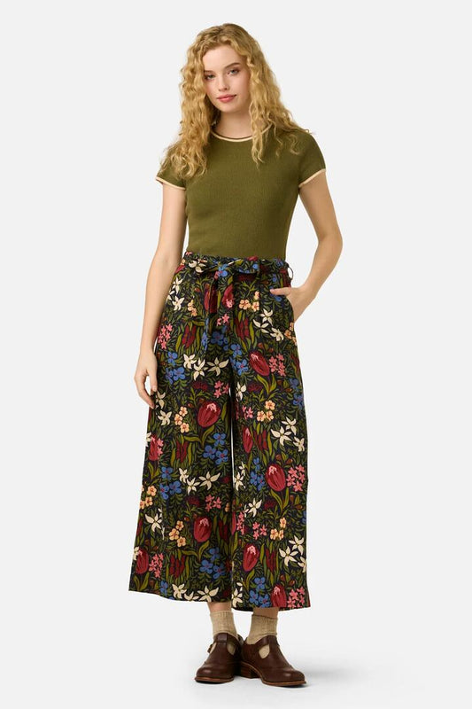 Image of a model wearing Pants. Product name - Mira Native Flora Culotte in Navy colour by brand - Princess Highway