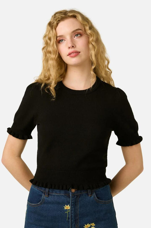 Image of a model wearing Tops. Product name - Zoe Ruffle Knit Top in Cream colour by brand - Princess Highway