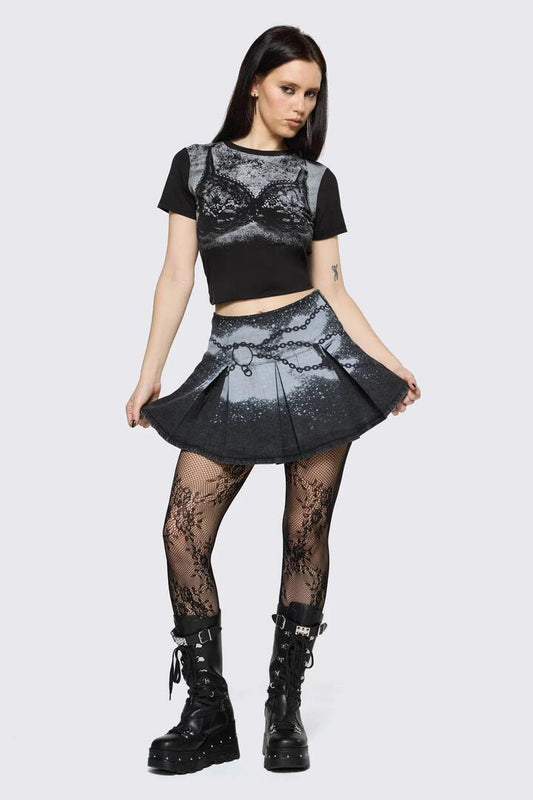 Image of a model wearing Skirts. Product name - Spray It Goth Skort in Black colour by brand - Black Friday