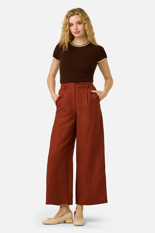 Image of a model wearing Pants. Product name - Layla Culotte in Henna colour by brand - Princess Highway