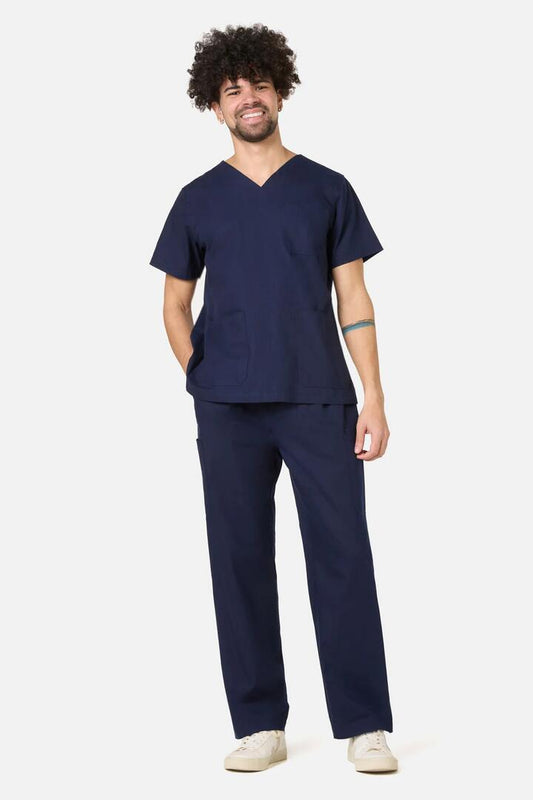Image of a model wearing Uniforms & Workwear. Product name - 100% Cotton Navy Scrub Set in Navy colour by brand - Scrubs With Love