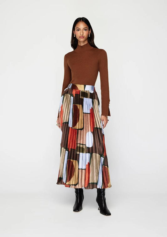 Image of a model wearing Skirts. Productname: Koa Pleated Skirt | MOS The Label in Koa Print colour by brand - MOS The Label