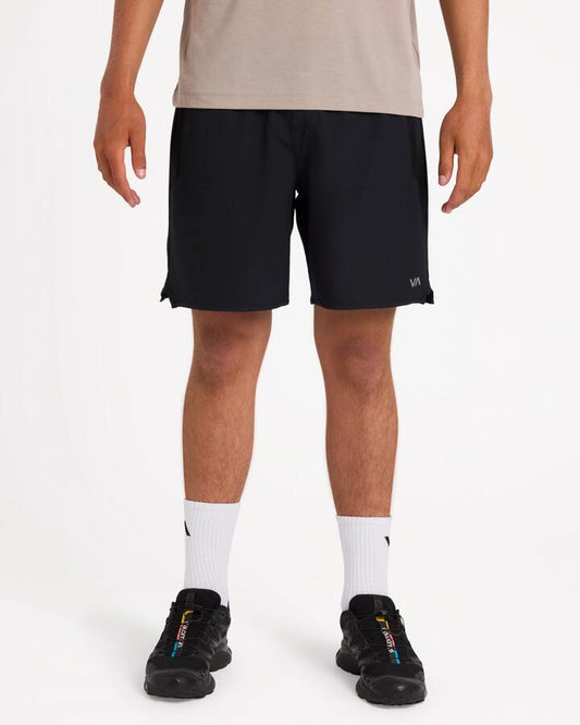 Image of a model wearing Shorts. Product name - Rvca Mens Yoggers 2 In 1 Shorts Black 2 in Black 2 colour by brand - Rvca