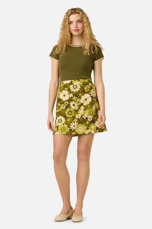 Image of a model wearing Skirts. Product name - Twiggy Floral Mini Skirt in Olive Green colour by brand - Princess Highway