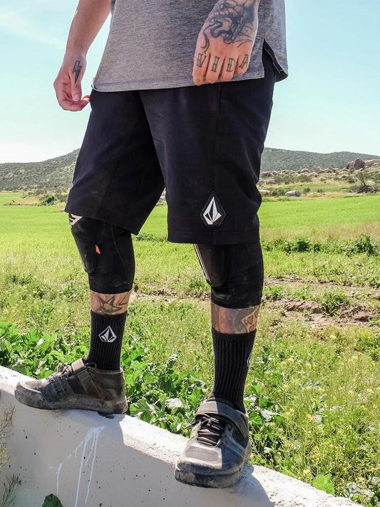 Image of a model wearing Shorts. Product name - Volcom Mens Trail Ripper 23" Shorts Black in Black colour by brand - Volcom