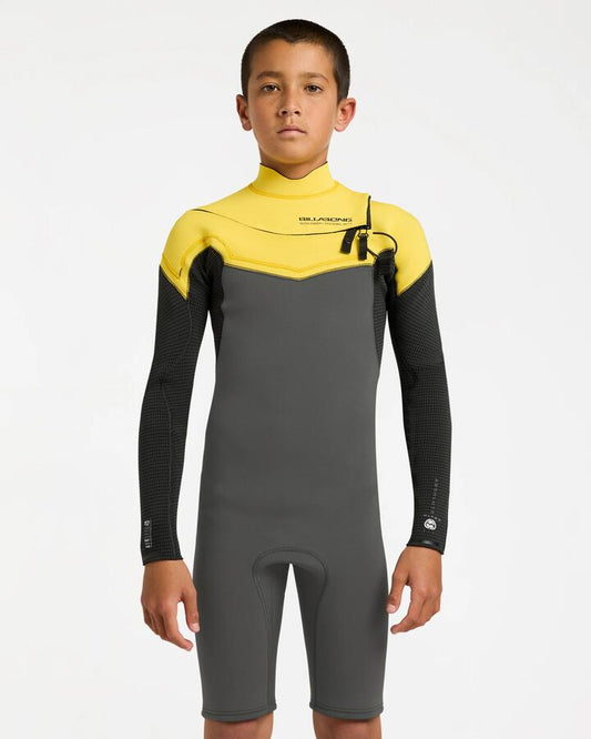 Image of a model wearing Tops. Product name - Billabong Boys 8-16 2/2 Absolute Ultra Long Sleeve Chest Zip Springsuit Orange in Orange colour by brand - Billabong