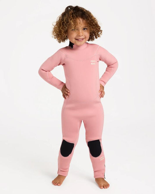 Image of a model wearing Tops. Product name - Billabong Girls 2-6 3/2 Absolute Long Sleeve Wetsuit French Rose in French Rose colour by brand - Billabong