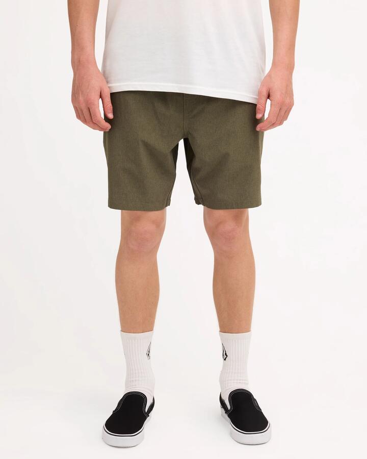 Image of a model wearing Shorts. Product name - Volcom Mens Stoneshybrid Shorts Wintermoss in Wintermoss colour by brand - Volcom