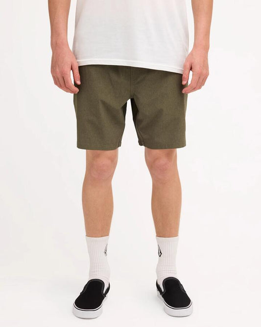 Image of a model wearing Shorts. Product name - Volcom Mens Stoneshybrid Shorts Wintermoss in Wintermoss colour by brand - Volcom