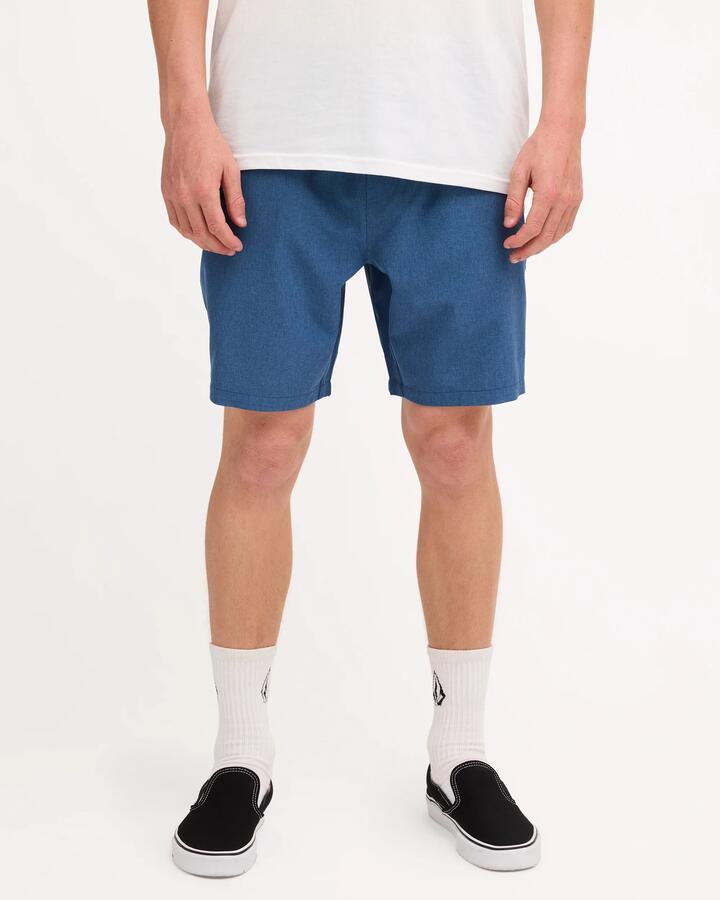 Image of a model wearing Shorts. Product name - Volcom Mens Stones Hybrid Shorts Smoke Blue in Smoke Blue colour by brand - Volcom