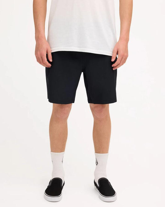 Image of a model wearing Shorts. Product name - Volcom Mens Stones Hybrid Shorts Black in Black colour by brand - Volcom