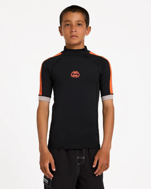 Image of a model wearing Tops. Product name - Billabong Boys 8-16 Boys Spec 73 Pf Short Sleeve Rash Vest Black in Black colour by brand - Billabong