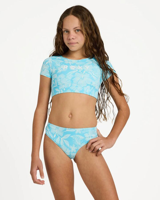 Image of a model wearing Tops. Product name - Roxy Girls 8-16 Cargo Dreams Crop Two Piece Splish Splash Cargo Dream in Splish Splash Cargo Dream colour by brand - Roxy