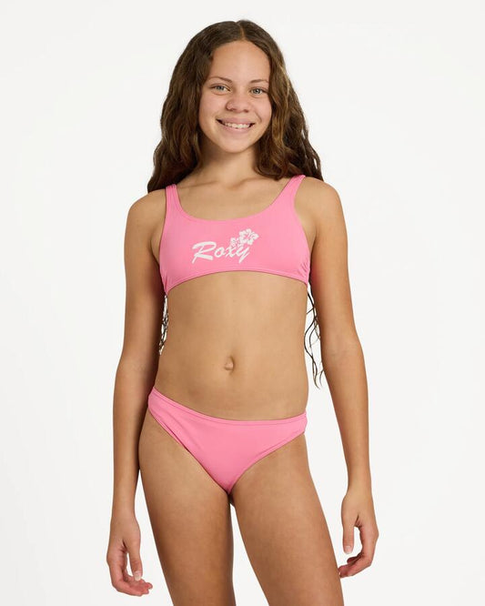 Image of a model wearing Tops. Product name - Roxy Girls 8-16 Summer Wave Bralette Two Piece Pink Carnation in Pink Carnation colour by brand - Roxy