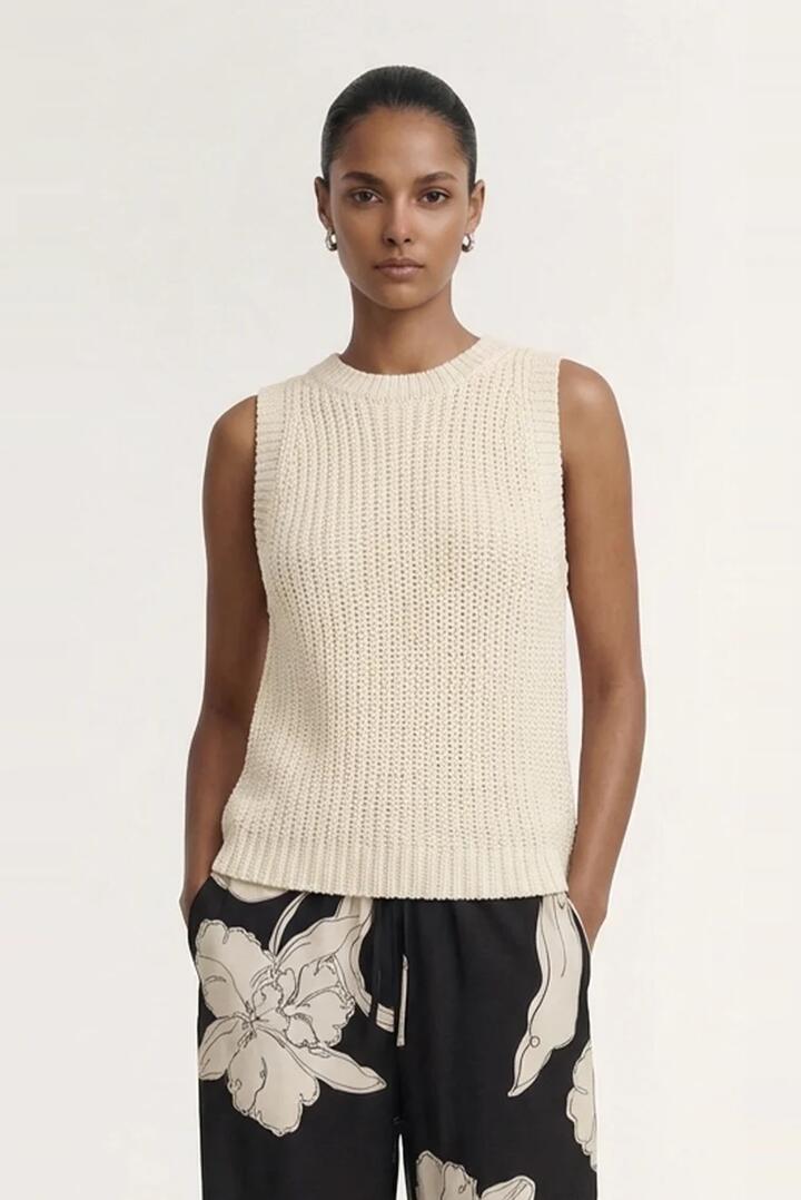 Image of a model wearing Tops. Product name - Cove Natural Beige Knit Tank in Natural colour by brand - Staple The Label