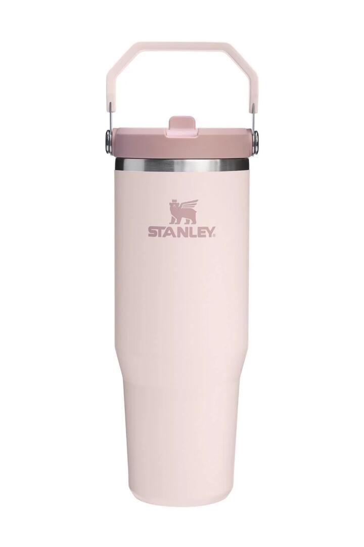 Image of a model wearing Tops. Product name - IceFlow Rose Quartz Flip Straw Top Handle 887ml 2.0 Tumbler in colour by brand - Stanley