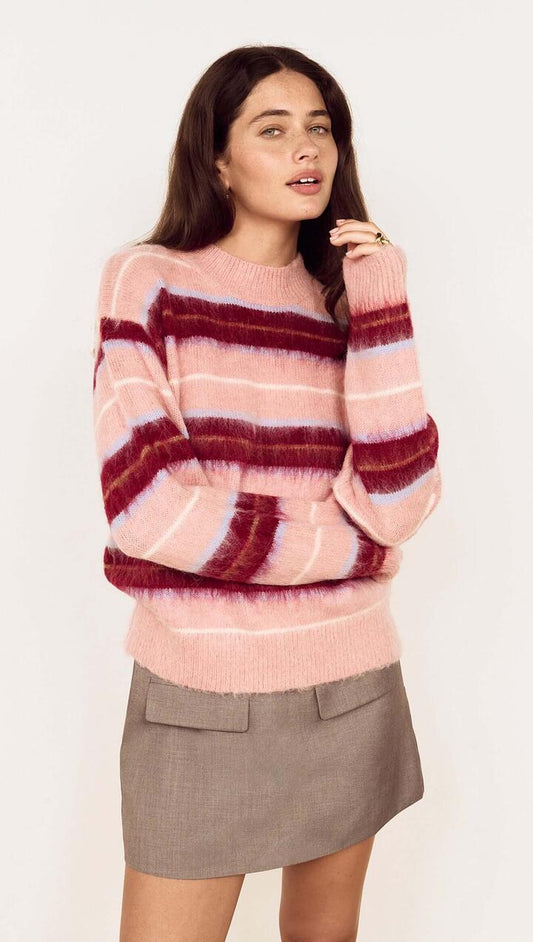 Image of a model wearing Outerwear. Product name - Pink Brushed Stripe Crew Neck Sweater in Pink/Wine Stripe colour by brand - MINKPINK