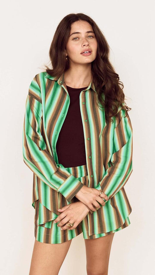 Image of a model wearing Tops. Product name - Green Stripe Cotton Oversized Shirt in Stripe colour by brand - MINKPINK