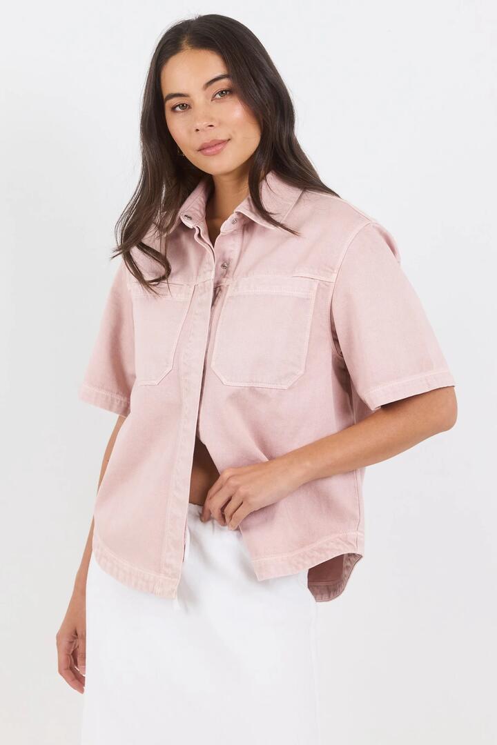 Image of Coats & Jackets. Product name - Crucial Pale Pink Denim Short Sleeve Shacket in Pale Pink colour by brand - Stories be Told