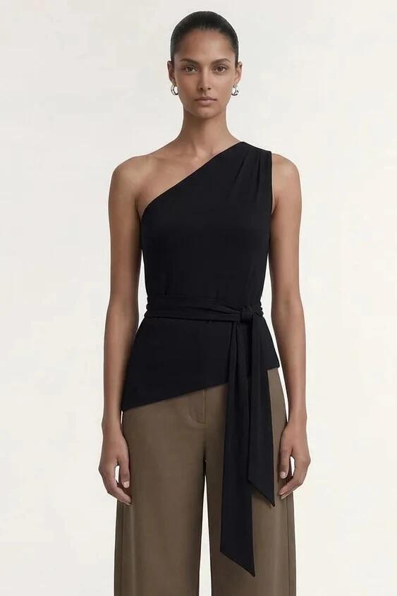 Image of a model wearing Tops. Product name - Zara Black One Shoulder Tie Top in Black colour by brand - Staple The Label