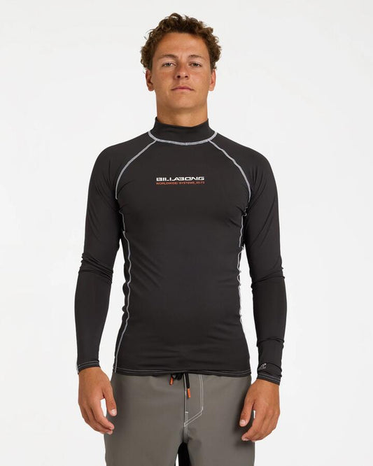 Image of a model wearing Tops. Product name - Billabong Mens Spec 73 Pf Long Sleeve Surf Shirt Washed Black in Washed Black colour by brand - Billabong