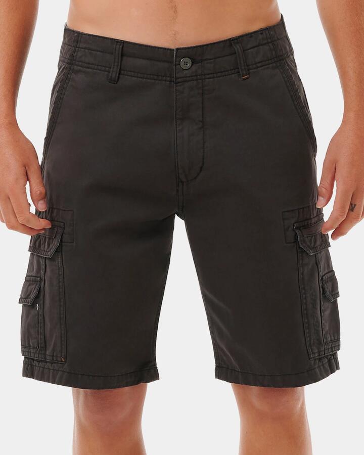 Image of a model wearing Shorts. Product name - Rip Curl Mens Classic Surf Trail Cargo Shorts Black in Black colour by brand - Rip Curl