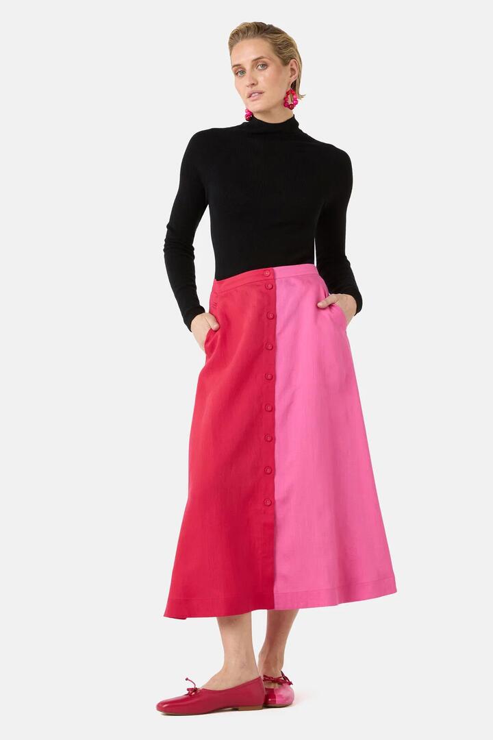 Image of a model wearing Skirts. Product name - Icy Pop Linen Skirt in Pink colour by brand - Gorman
