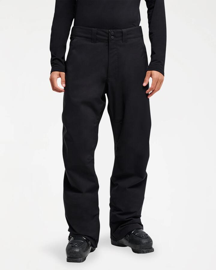 Image of a model wearing Pants. Product name - Quiksilver Mens Estate 10K Snow Pants Black in Black colour by brand - Quiksilver