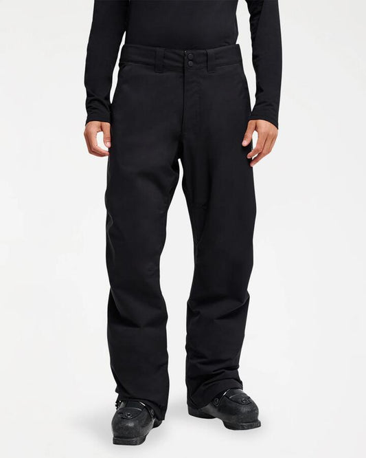 Image of a model wearing Pants. Product name - Quiksilver Mens Estate 10K Snow Pants Black in Black colour by brand - Quiksilver