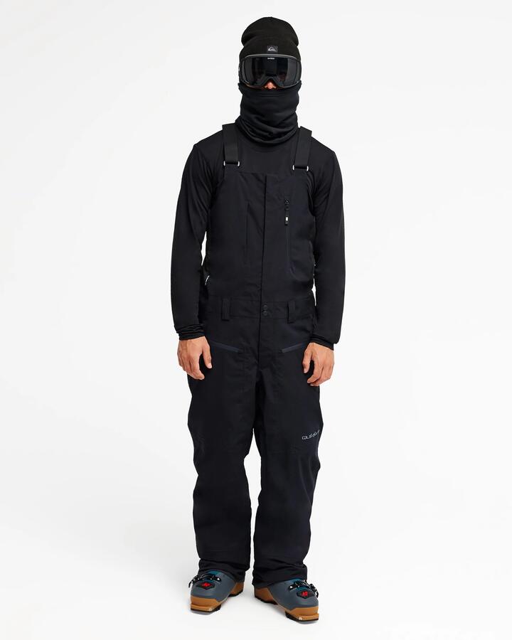 Image of a model wearing Pants. Product name - Quiksilver Mens Paramo Stretch 20K Bib Snow Pants Black in Black colour by brand - Quiksilver