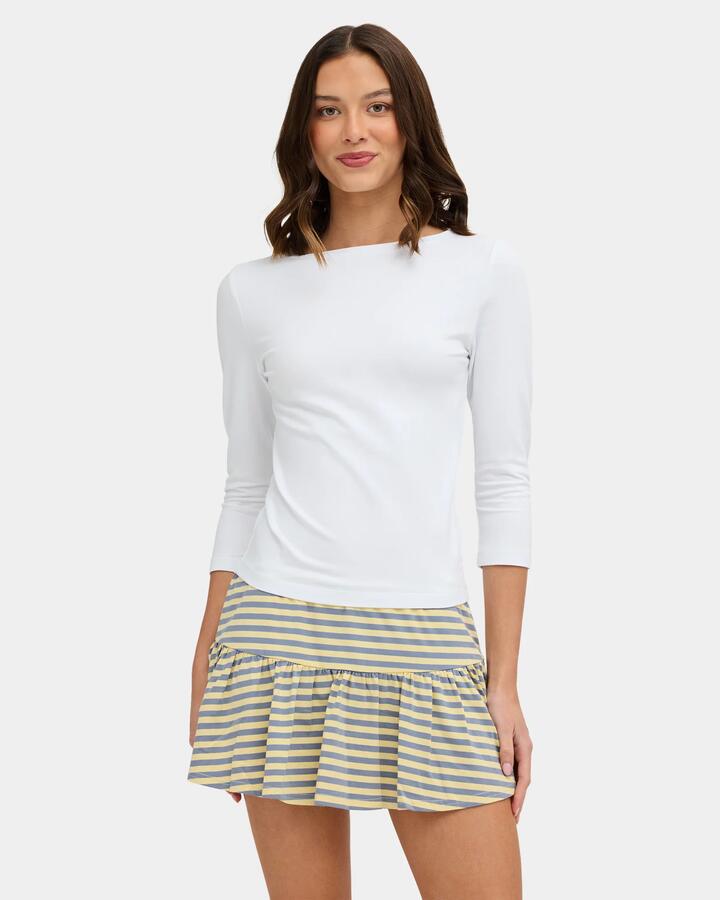 Image of a model wearing Tops. Product name - Nunui Womens Sabrina 3/4 Long Sleeve T-Shirt White in White colour by brand - Nunui