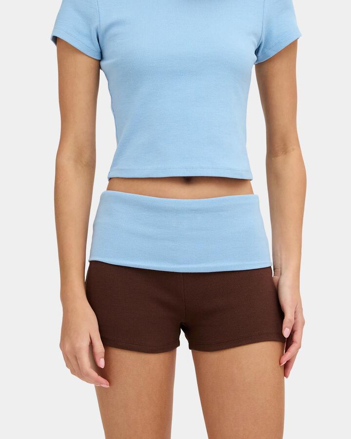 Image of a model wearing Shorts. Product name - Nunui Womens Kincaid Elastic Waist Shorts Chocolate in Chocolate colour by brand - Nunui