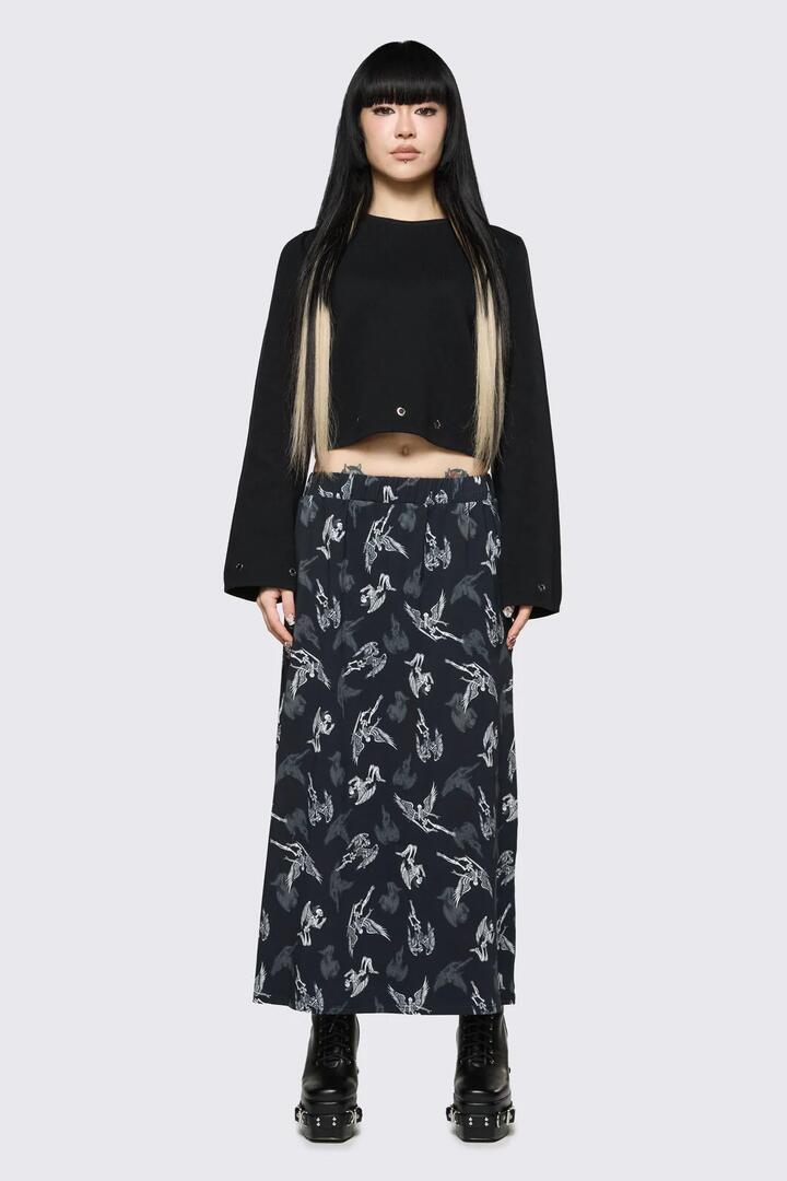 Image of a model wearing Skirts. Product name - Archangel Print Goth Midi Skirt in Black/White colour by brand - Dangerfield